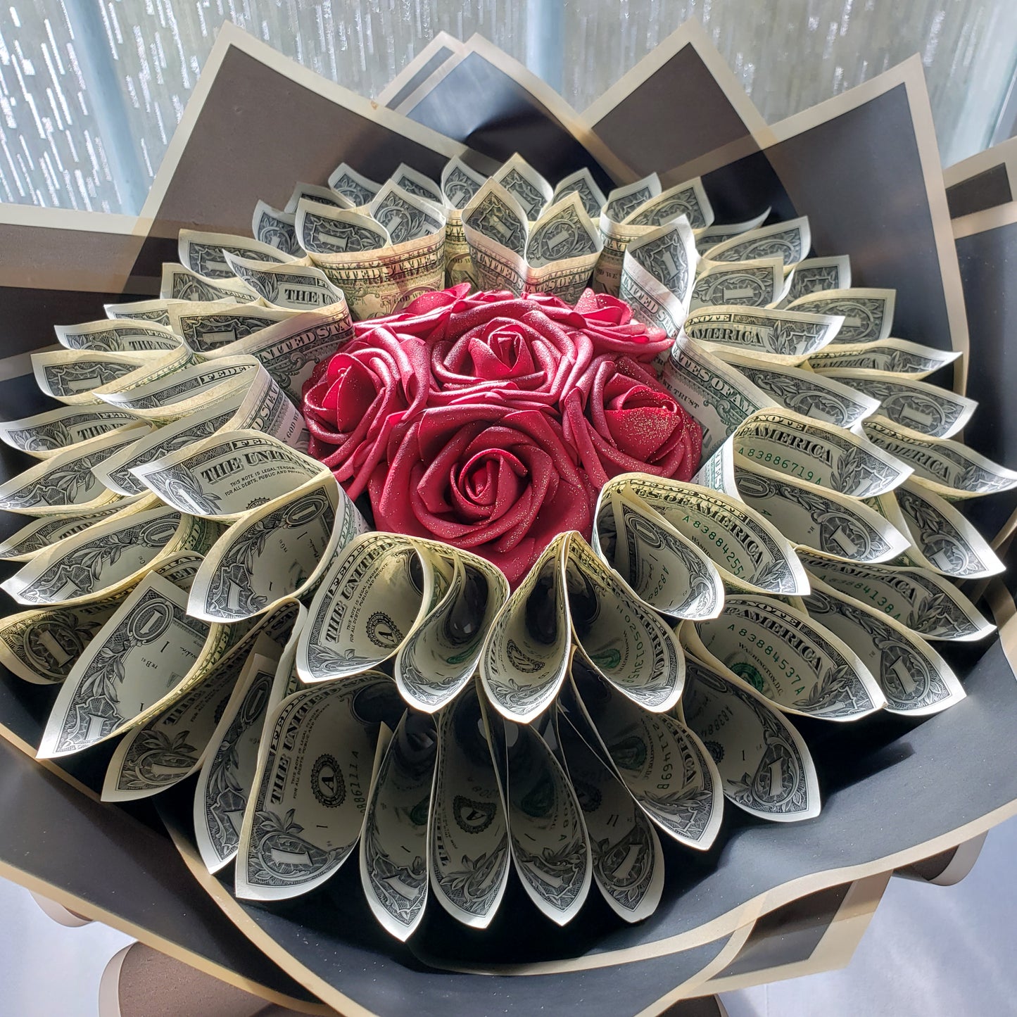 Money Boquet with faux foam roses sprayed with glitter