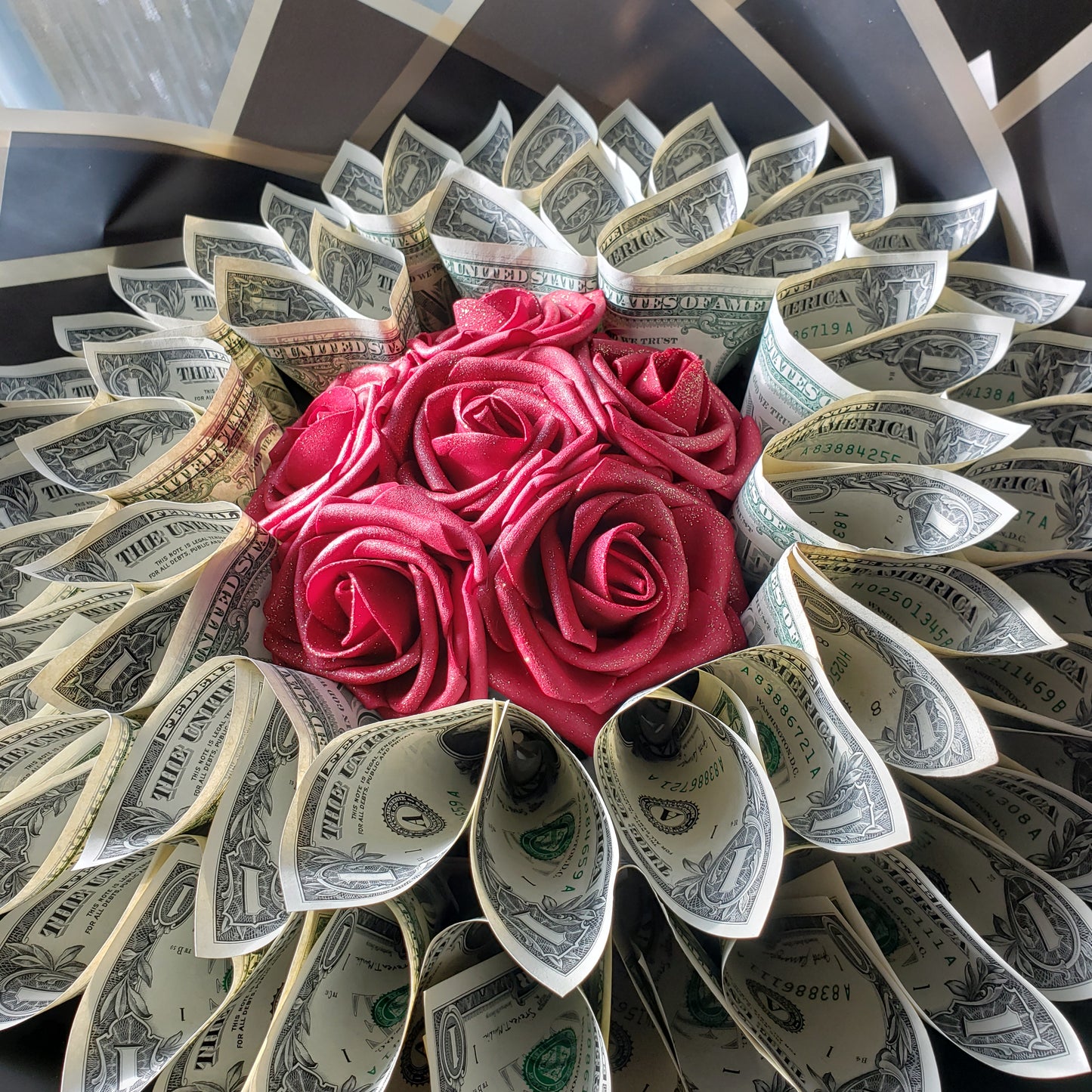 Money Boquet with faux foam roses sprayed with glitter