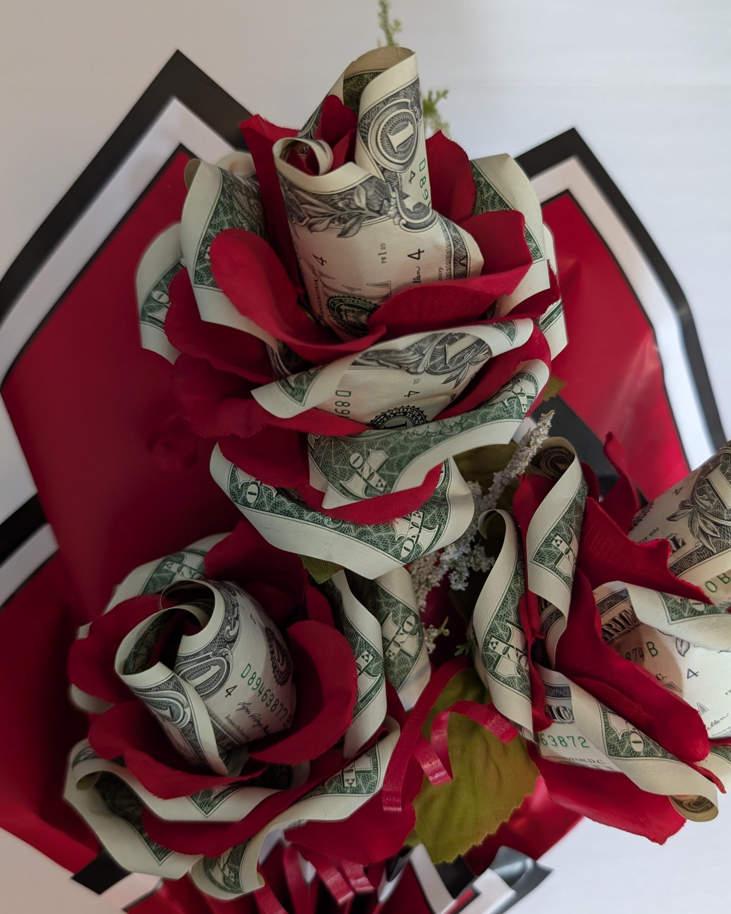 Handheld Money Bouquets with faux foam roses sprayed with glitter