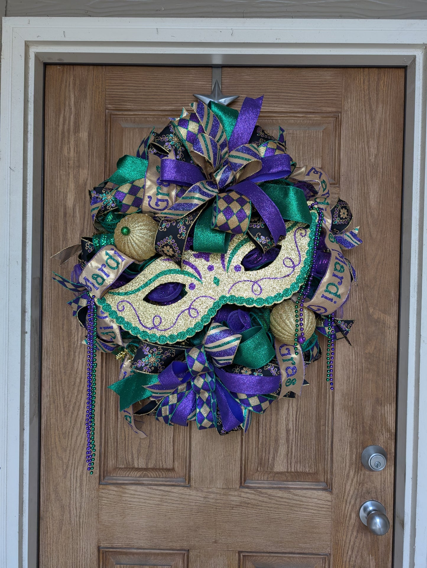 Mardi Gras mask wreath door hanger