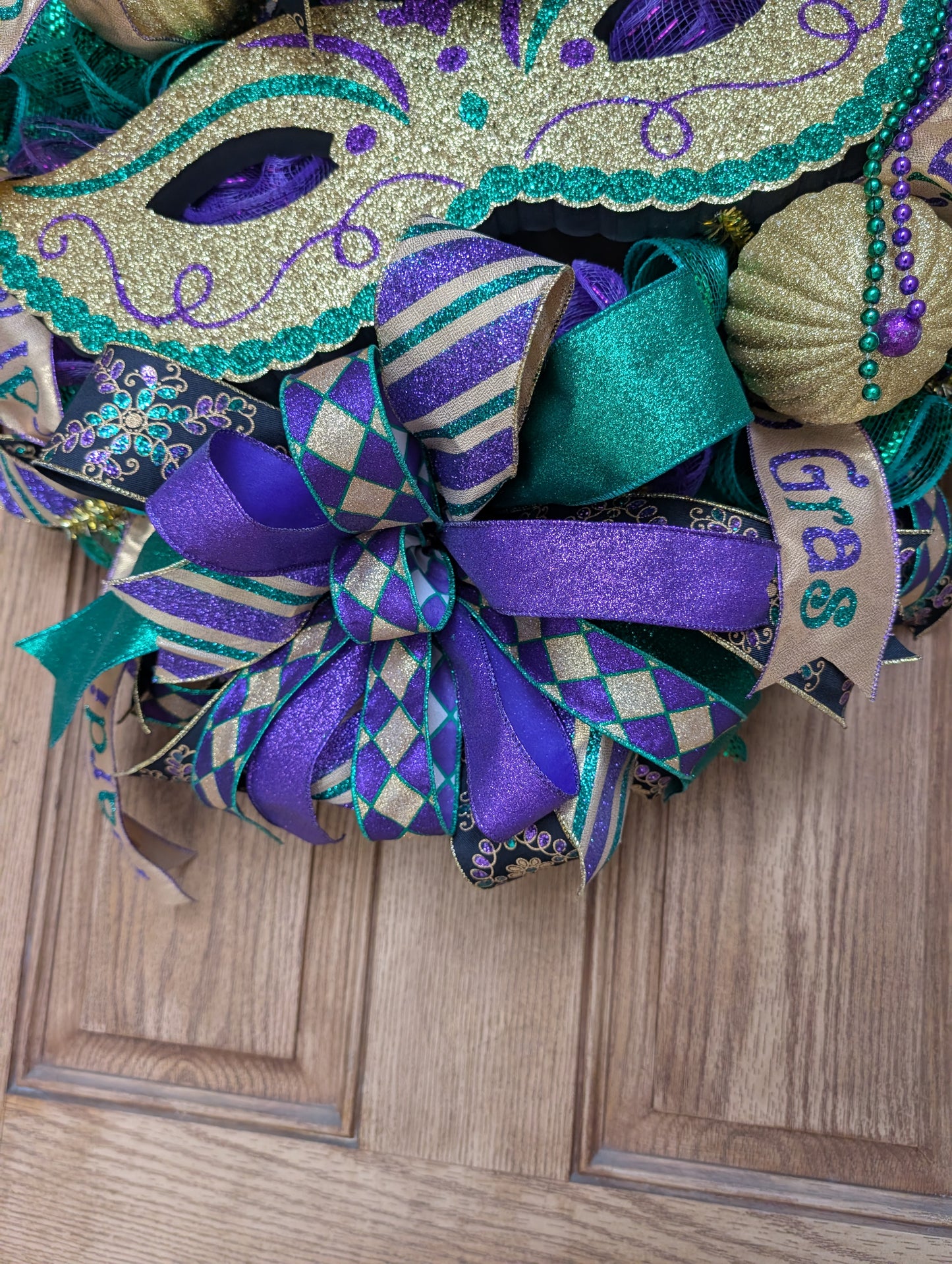 Mardi Gras mask wreath door hanger