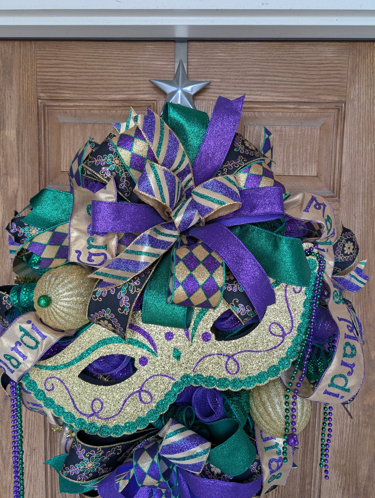 Mardi Gras mask wreath door hanger