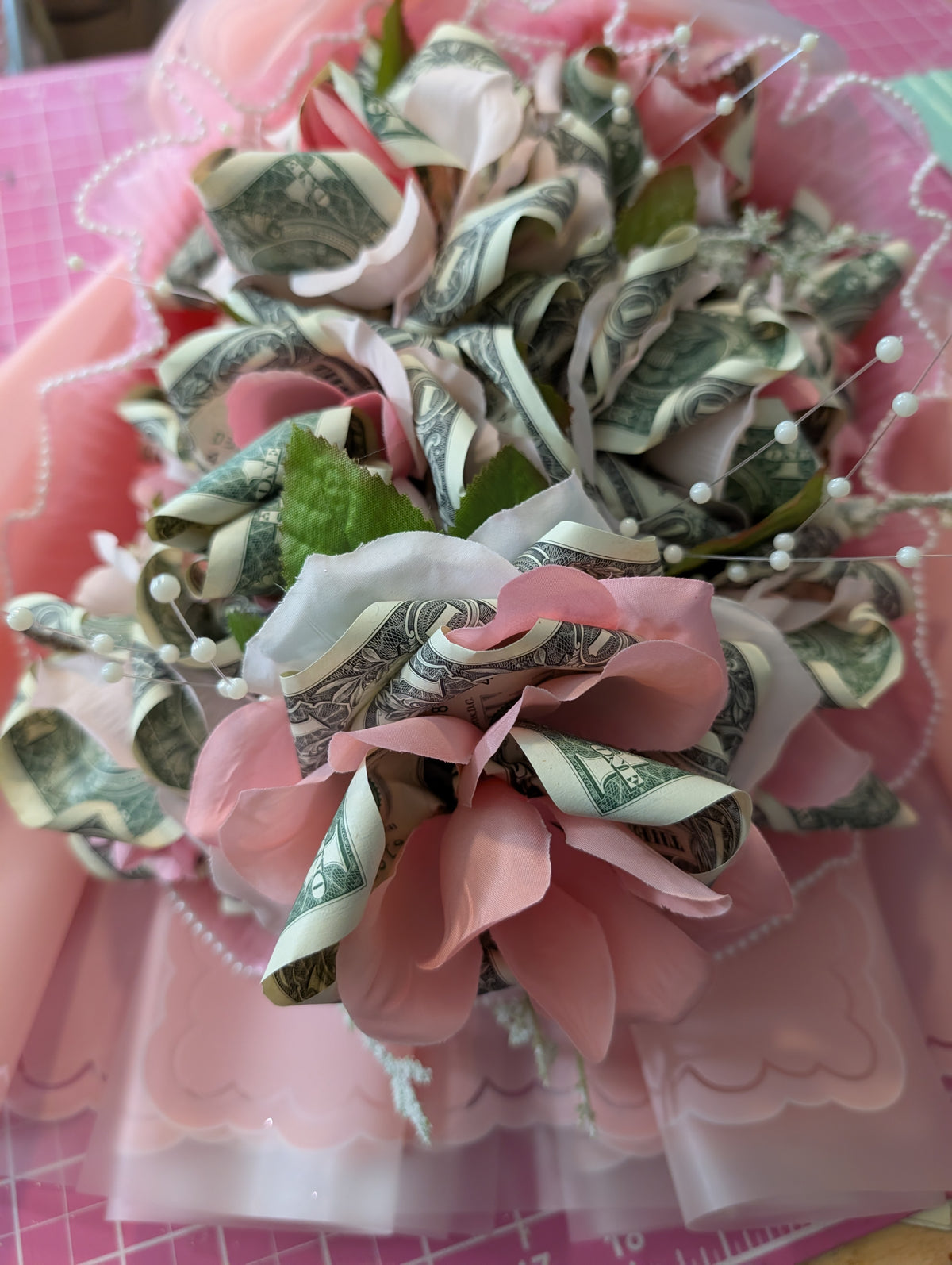 Handheld Money Bouquets with faux foam roses sprayed with glitter. In ...