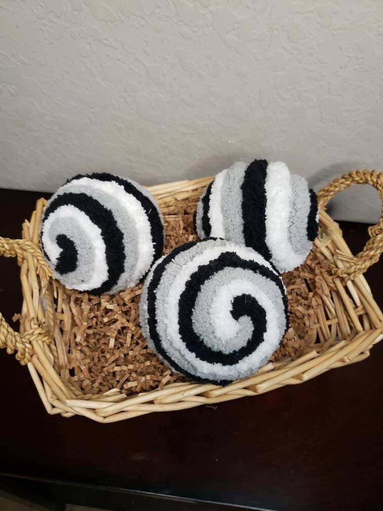 White, grey, and black ball wreath attachments or decorating ideas