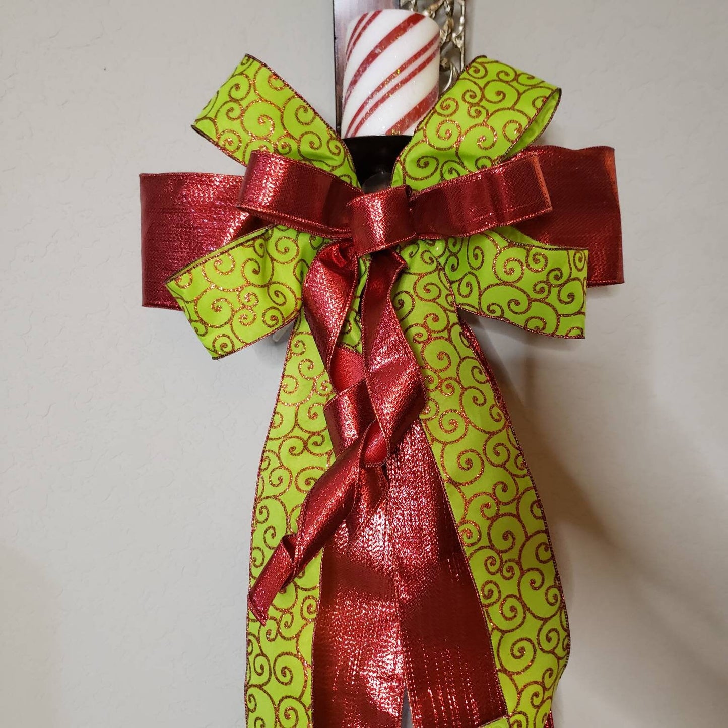 Premade, lime green, red, scroll, lantern, tree topper, bow, will be the perfect addition to any decor.